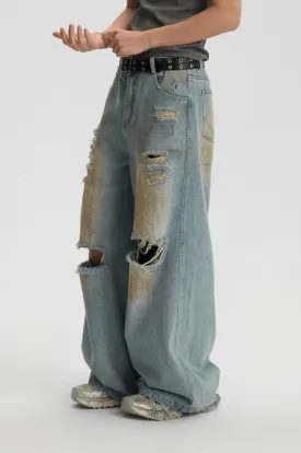 Distressed And Ripped Baggy Jeans With Washed Effect